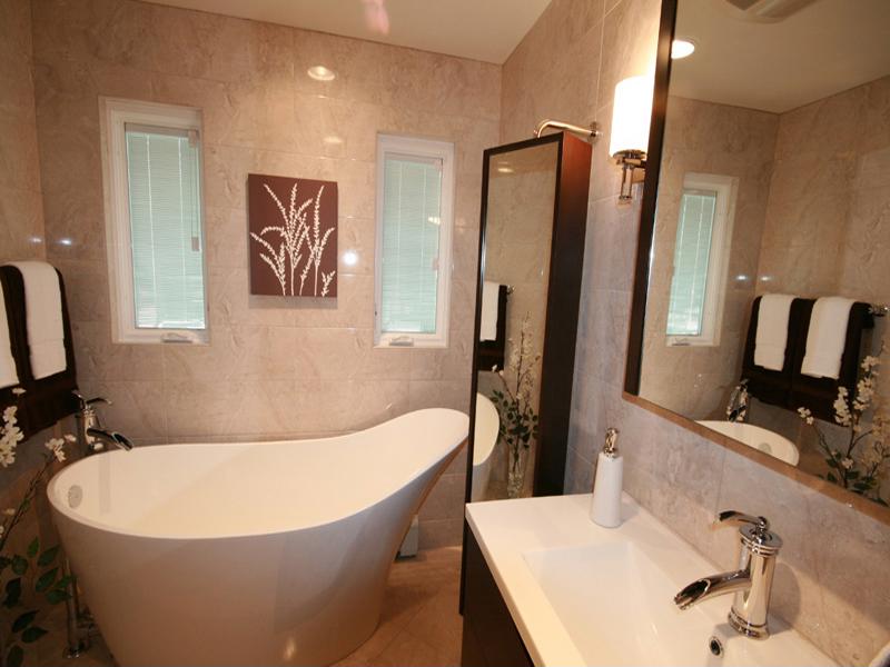 This bathroom remodel included an upgraded bathtub and new sink.