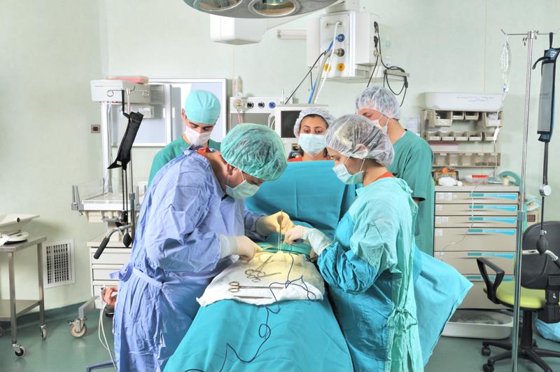 An operating room team at work.