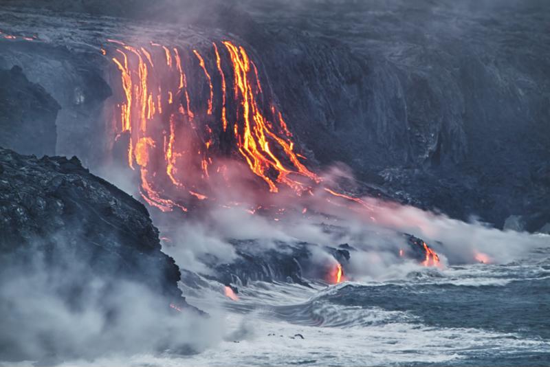 Only here will you be able to see lava flow directly into the ocean waves. 