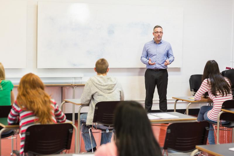 A professor leads a university lecture.