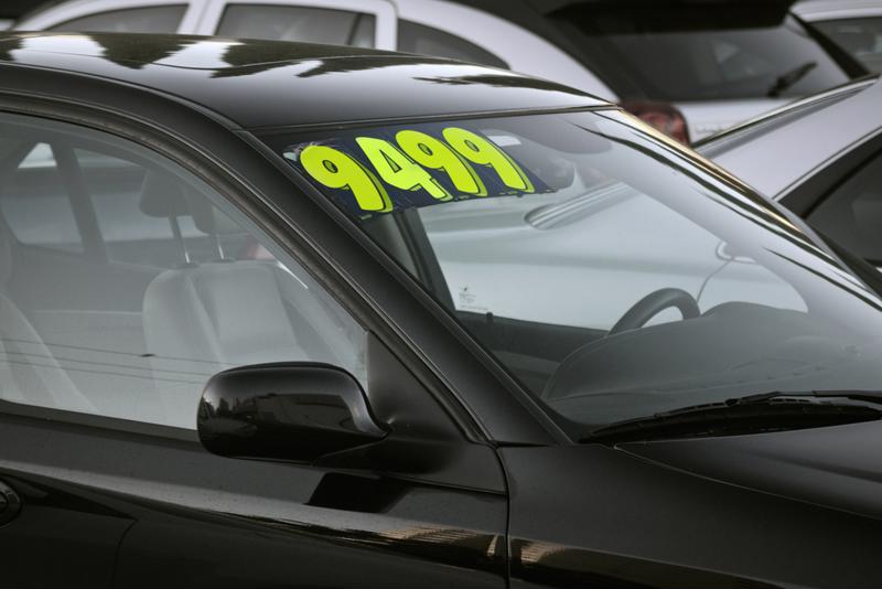 Added supply helped dealers rein in new and used car prices.