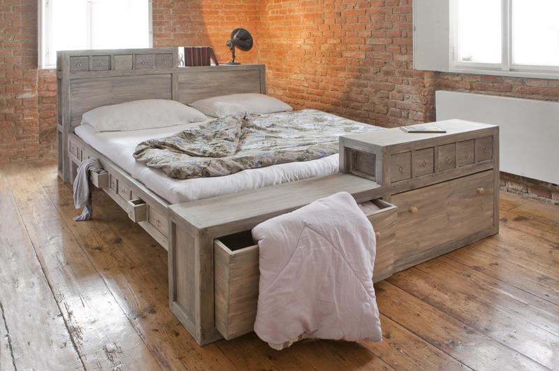 A bed frame can easily serve multiple purposes with added storage options.