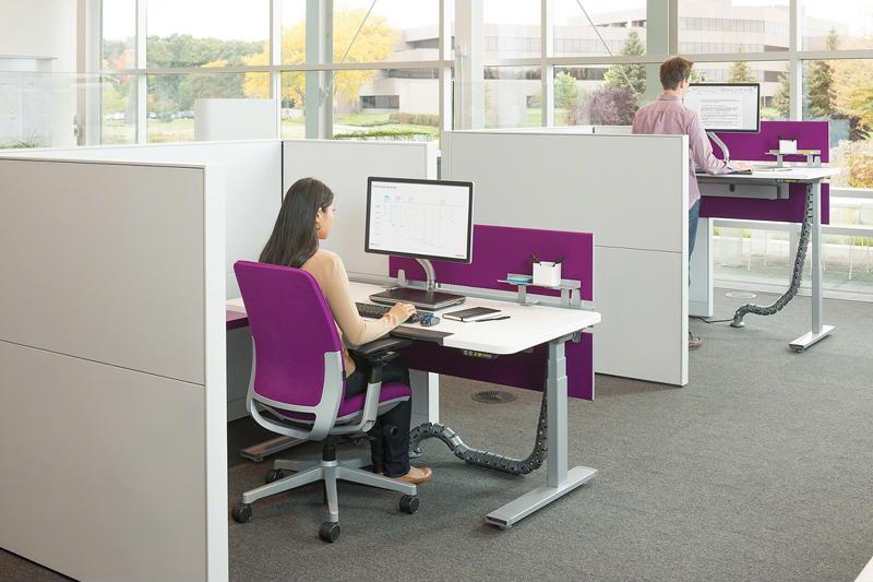 Office Designs carries the Herman Miller Renew sit-to-stand table, an adjustable height desk that lets one go from sitting to standing in seconds.