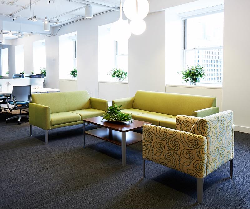 A seating area for guests to relax in can help make the office more inviting and welcoming.