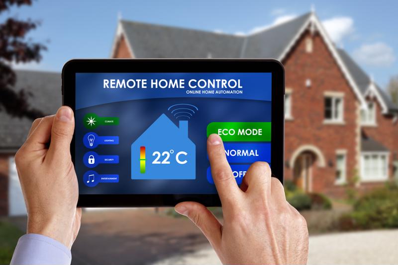 Homeowners uses a tablet to adjust home temperature
