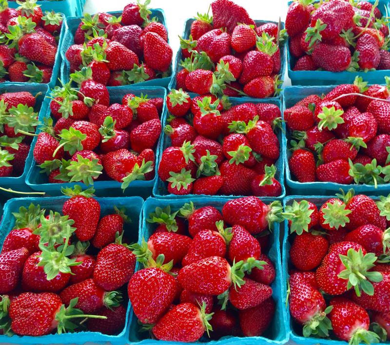 Baskets of fresh strawberries. 