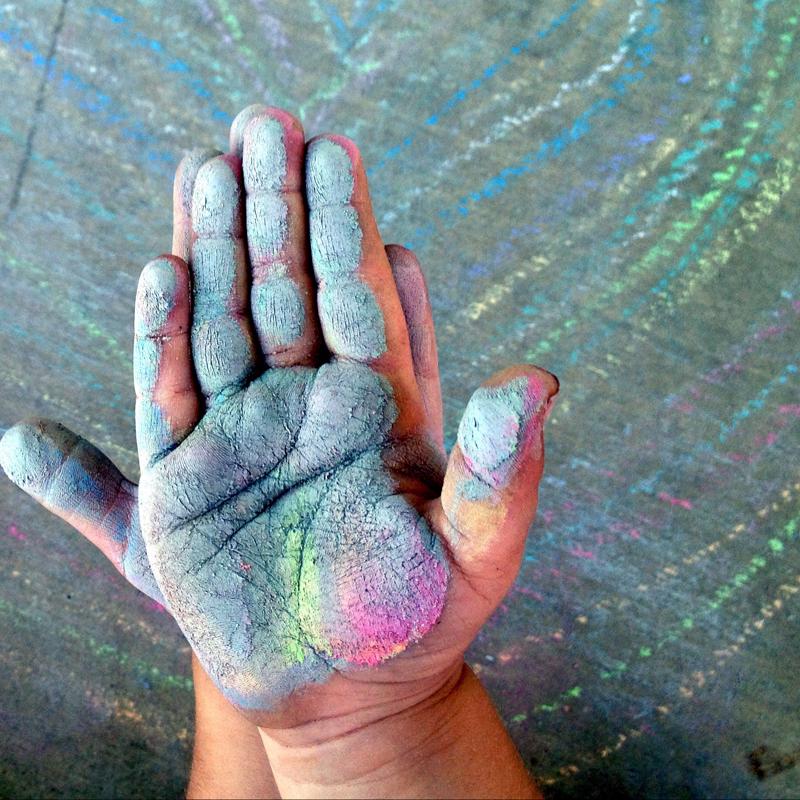 Cover your toddler's tiny hands in chalk and preserve the image forever.