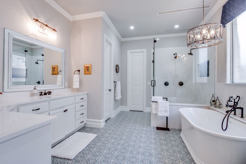 Small sconces make a big statement in the bathroom.