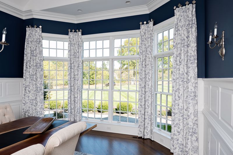 Make your windows look larger and brand new with updated drapery.