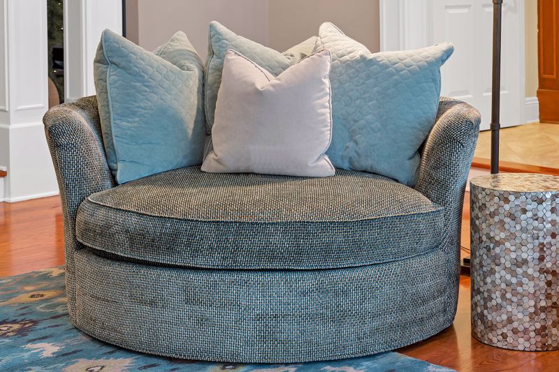 A comfy armchair will add warmth to your space.