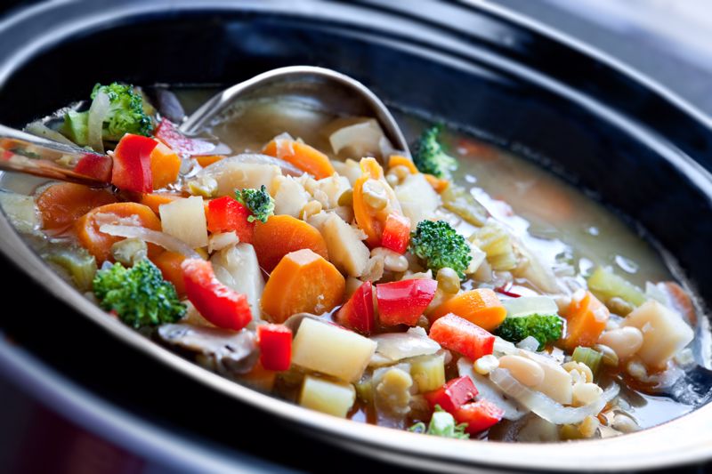 Vegetables cook in a slow cooker