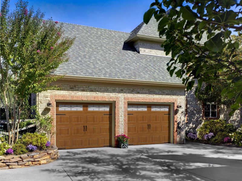 While a traditionally wooden garage door might not be the best choice for your lifestyle, faux wood doors could be the solution you're looking for.
