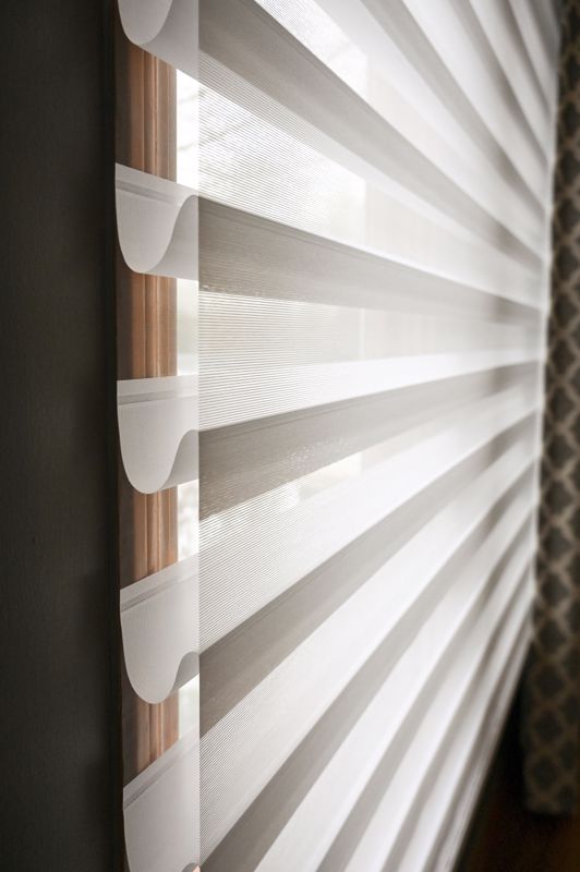 Shutters and blinds as summer window treatments.