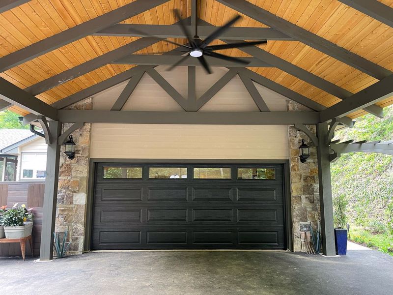 Windowed garage doors add to the curb appeal of your property.